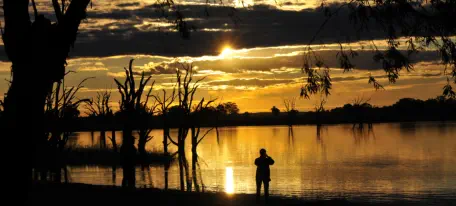 Lake Bonney SA sunset with a bodyguard in the shadows ...