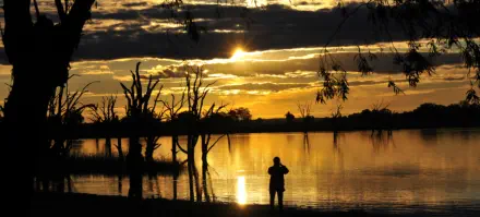 Lake Bonney SA sunset with a bodyguard in the shadows ...