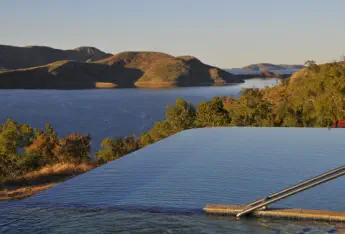 Lake Argyle Resort swimming pool overlooking massive dam ...